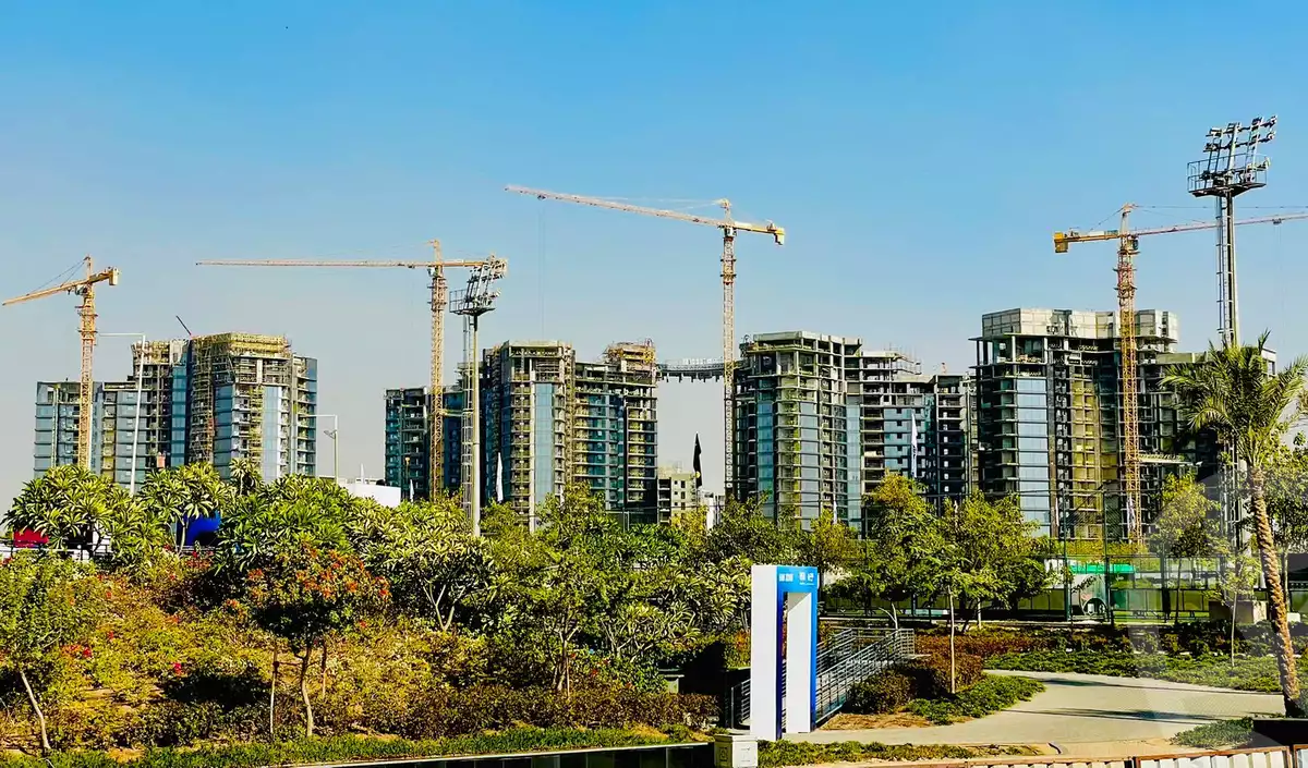 https://aqarmap.com.eg/ar/listing/5707634-for-sale-cairo-el-sheikh-zayed-city-compounds-zyd-wr-llttwyr-park-towers-zed-el-sheikh-zayed-compound