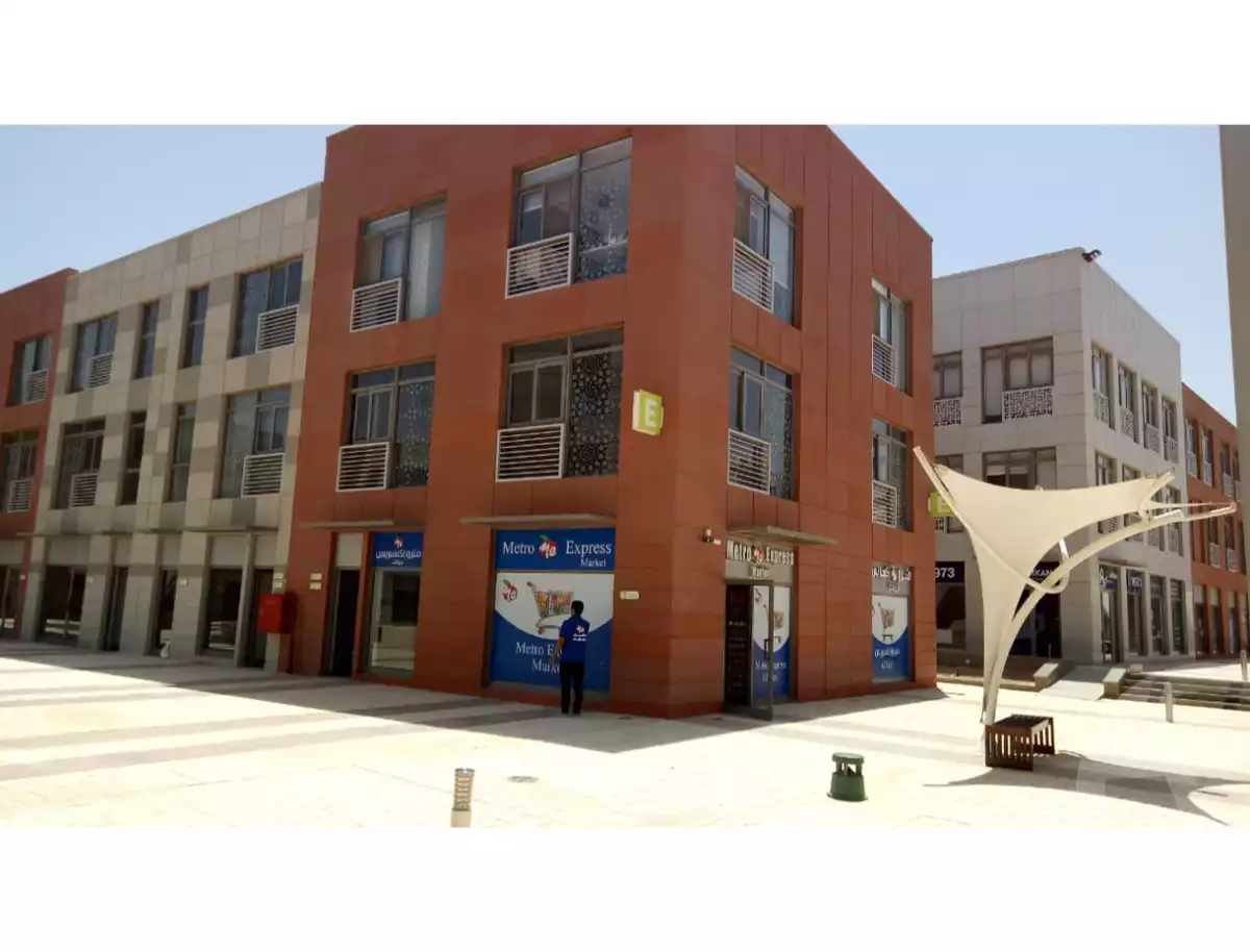 https://aqarmap.com.eg/ar/listing/6158031-for-sale-cairo-el-sheikh-zayed-city-compounds-the-courtyard-mall-dorra