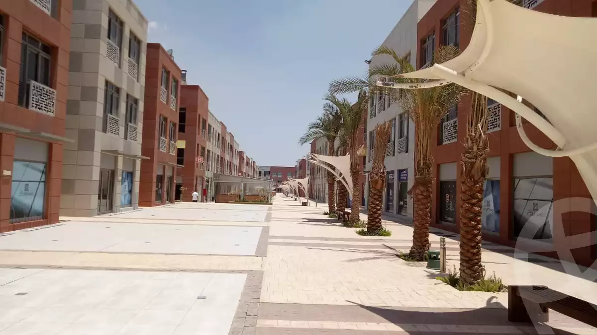 https://aqarmap.com.eg/ar/listing/6237997-for-sale-cairo-el-sheikh-zayed-city-compounds-the-courtyard-mall-dorra