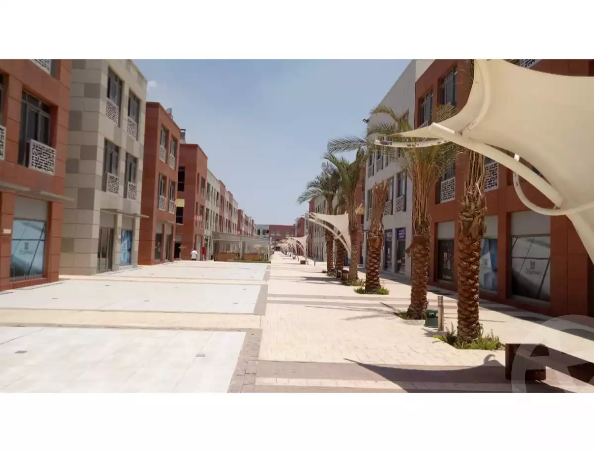 https://aqarmap.com.eg/ar/listing/6330780-for-sale-cairo-el-sheikh-zayed-city-compounds-the-courtyard-mall-dorra