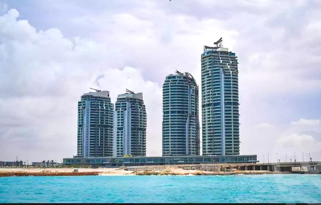 https://aqarmap.com.eg/ar/listing/7114774-for-sale-north-coast-new-alamein-mntj-t-l-lmyn-ljdyd-beachfront-tower-city-edge