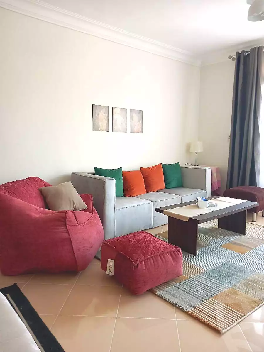 https://aqarmap.com.eg/ar/listing/7238285-for-rent-cairo-6th-of-october-el-hay-el-motamyz-first-touristic-village-el-shaheed-mohammed-abdul-latif-alshimi-st