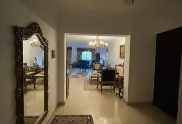 Ground floor apartment with a garden for sale in Al-Rehab City, 214 square meters in the seventh phase.