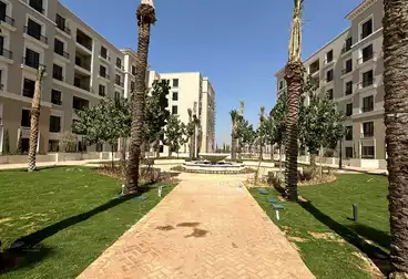 Apartment with Garden For sale in Village West Compound - Dorra