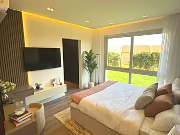 Apartment with Garden For sale in Mar Ville Compound - AlMarasem, Expansion Of El Sheikh Zayed City, 187 sqm