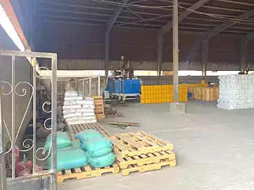 Factory For sale in Koum Abu Radi, El Wasta, 5608 sqm