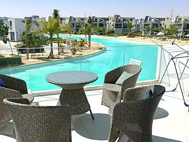 Apartment with Garden For sale in Fouka Bay Resort - Tatweer Misr, North Coast Resorts, 130 sqm