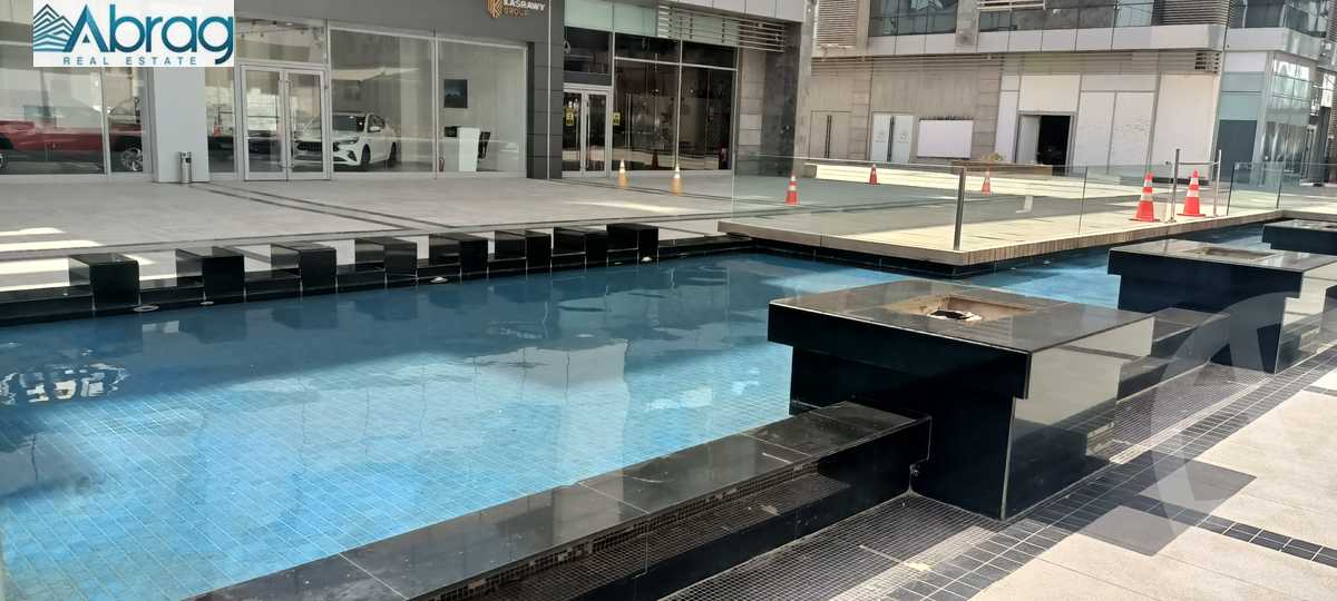 https://aqarmap.com.eg/ar/listing/4674822-for-sale-cairo-el-sheikh-zayed-city-compounds-rivulet-twin-towers-mall-dunes