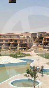 https://aqarmap.com.eg/ar/listing/4074513-for-sale-cairo-el-sheikh-zayed-city-compounds-in-sheikh-zayed-pyramids-walk