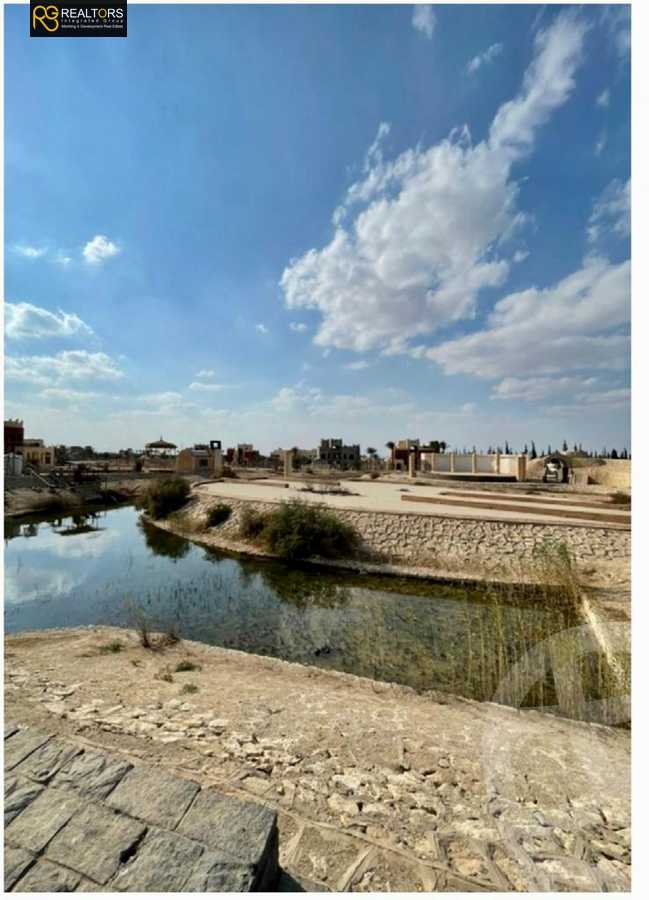 https://aqarmap.com.eg/en/listing/5227006-for-sale-cairo-el-sheikh-zayed-city-alex-cairo-desert-road-mdyn-sfnks-ljdyd-de-joya-park-compound-taj-misr