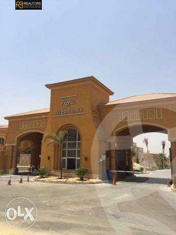 https://aqarmap.com.eg/en/listing/6366326-for-sale-cairo-el-sheikh-zayed-city-compounds-royal-meadows